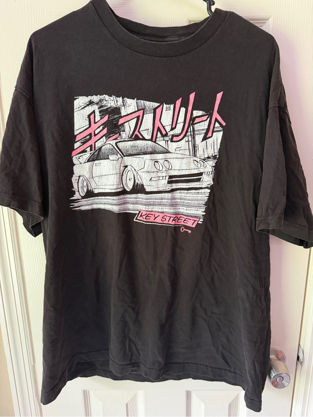 Black Graphic Tee with Pink Accents